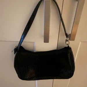 Svart handväska