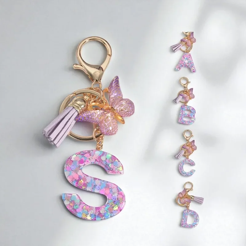 AliExpress - Porte-clés scintillant A-Z pour femmes et filles – Breloque pompon papillon scintillant avec strass, porte-monnaie élégant pour voiture, 