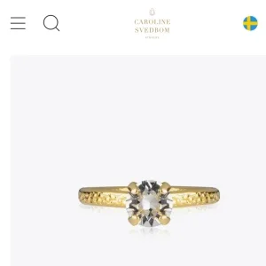 Guldring med klar sten Caroline Svedbom