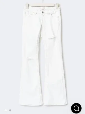 Vita bootcut jeans med brodyr