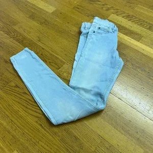 Ljusblå midwaist jeggings XS