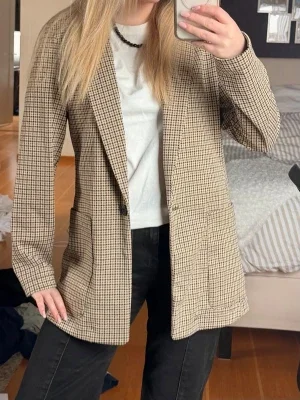 Beige-rutig oversized kavaj