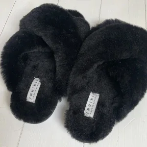 Tofflor från inuikii