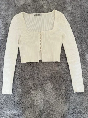 Vit ribbad cropped cardigan Dilvin