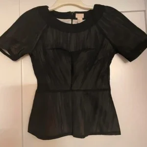 Svart blus med dragkedja från H&M